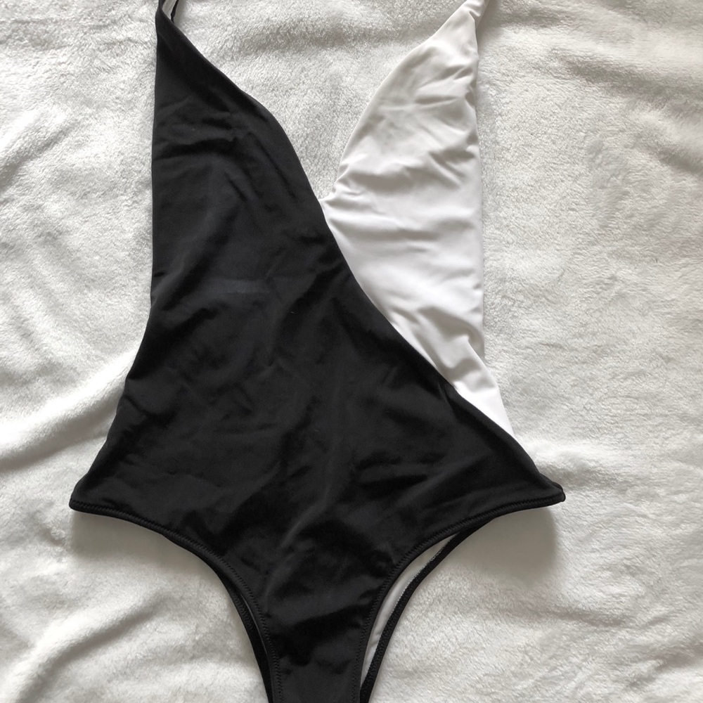 Black one piece swimsuit VS